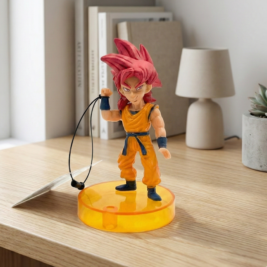 10cm Super Saiyan God Goku figure with crimson hair and fiery aura in a battle stance.