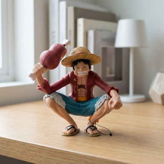 18cm Luffy action figure happily eating a large piece of meat. High-quality collectible.