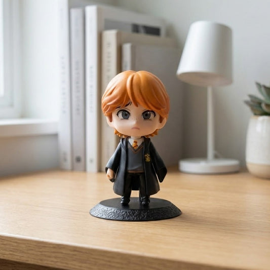 9cm Ron Weasley figure in Gryffindor robes, smiling and holding his wand. Nendoroid style.