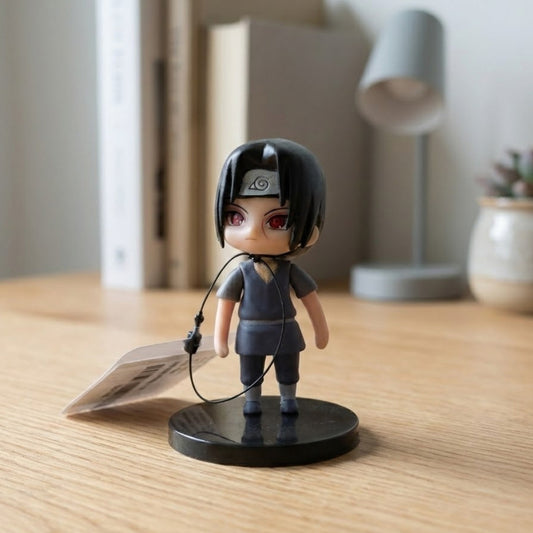 7cm Itachi Uchiha figure in Akatsuki robe, using Sharingan.